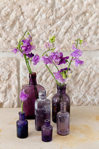 Selection of vintage purple bottles