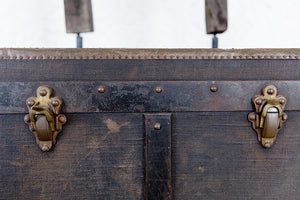 Vintage black steamer trunk